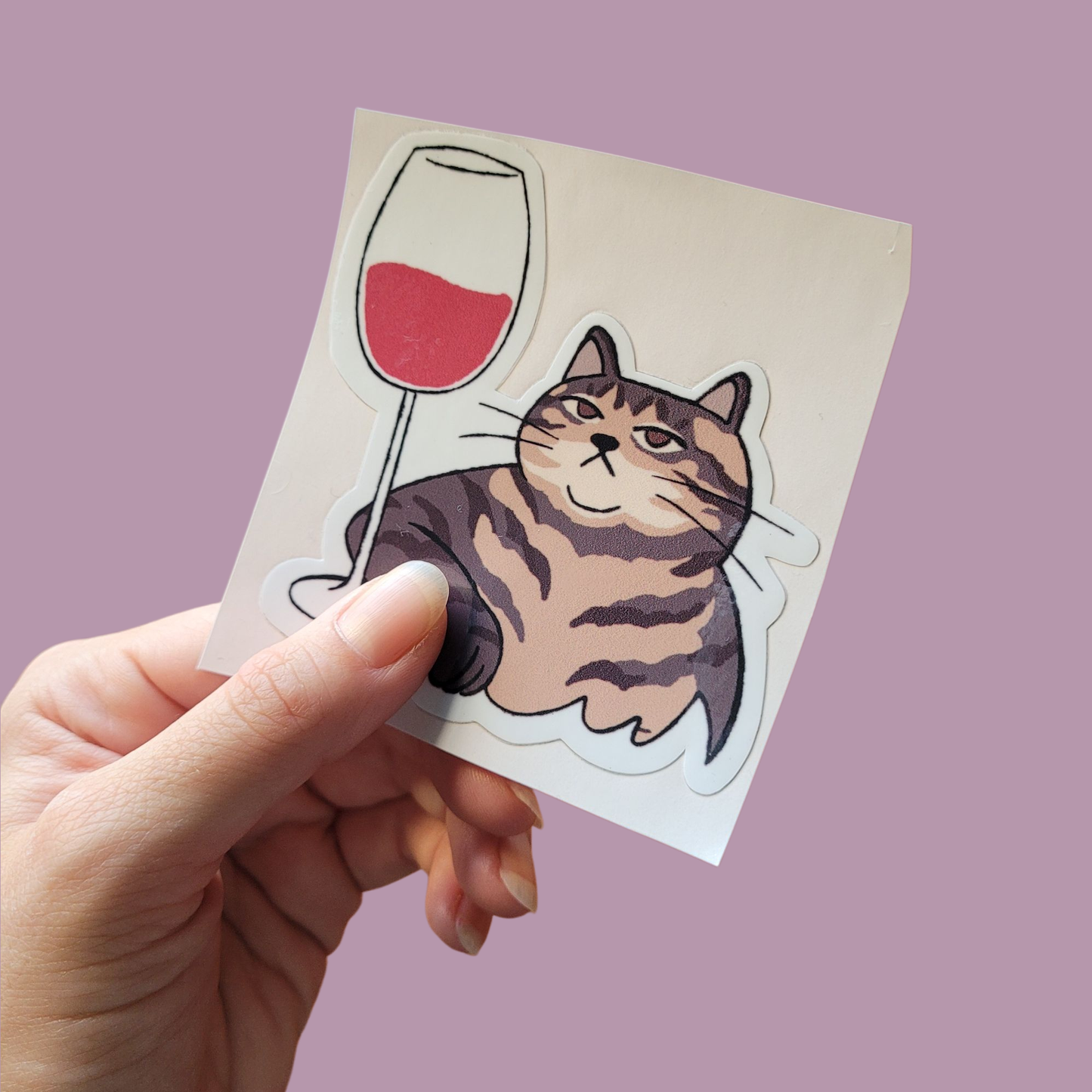 Pegotín de gato con vino