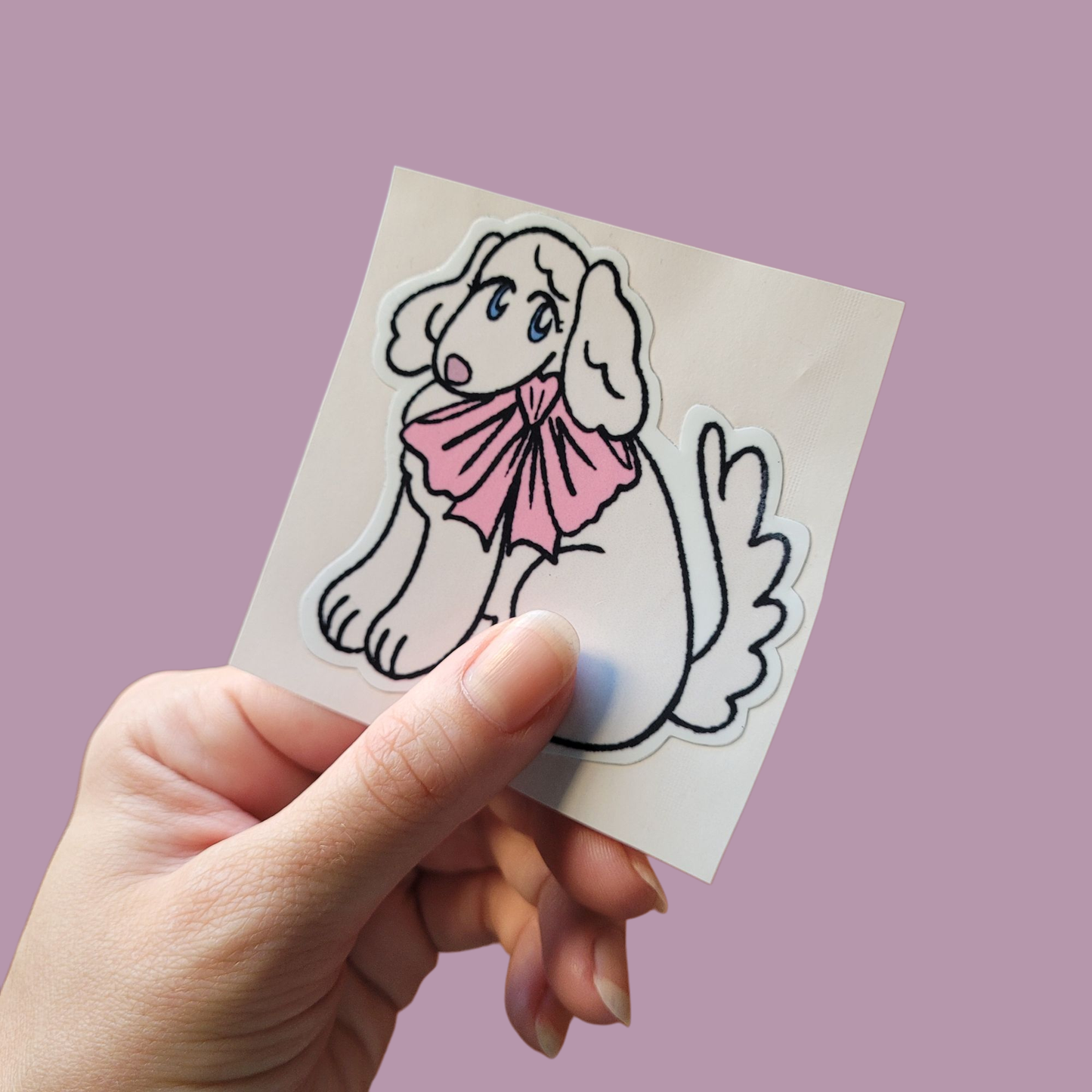 Pegotín de perrito con moño